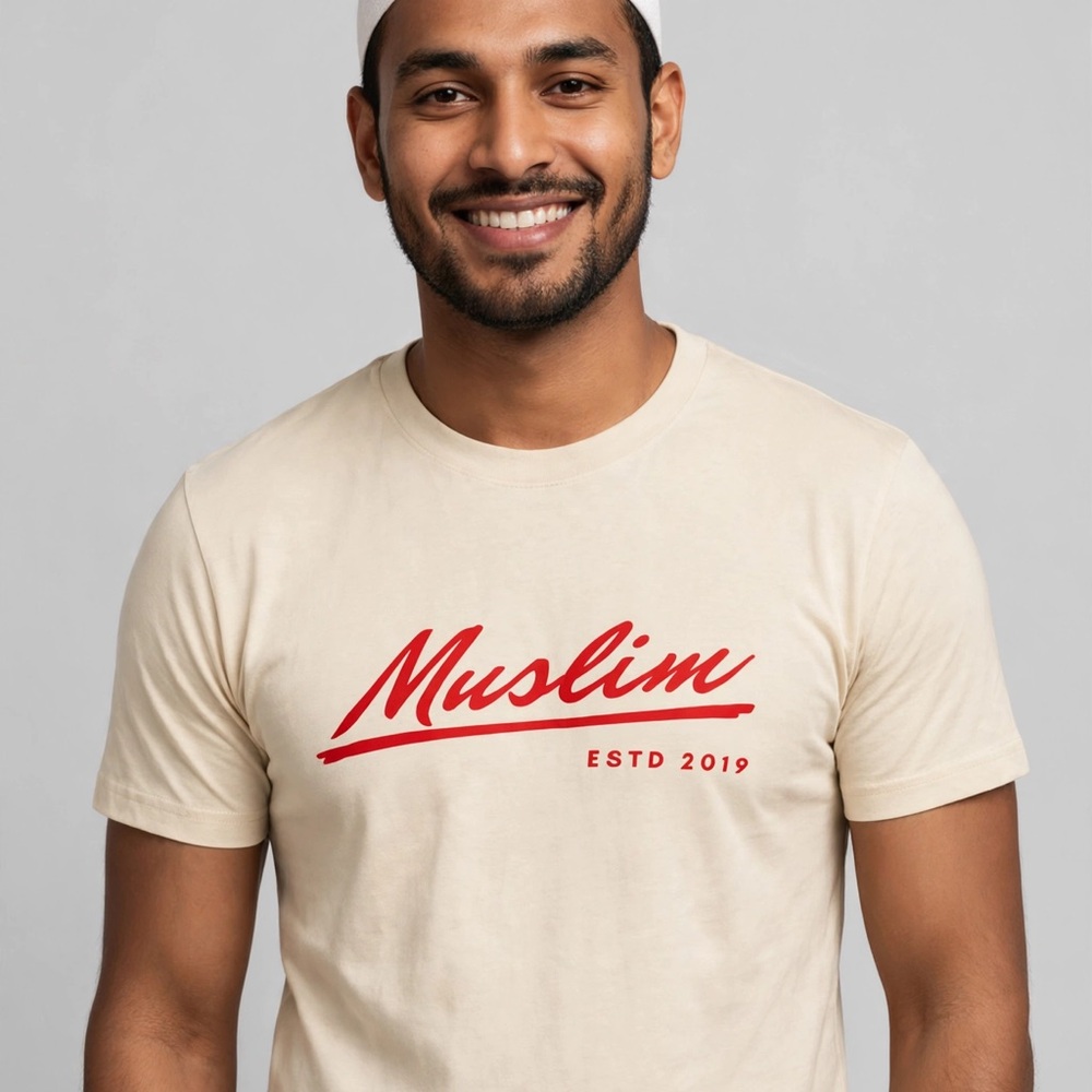Cream Short-Sleeve Graphic Tee with Red 'Muslim' Script